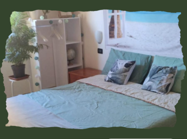 Casa Biancoli: camera da letto luminosa con piante